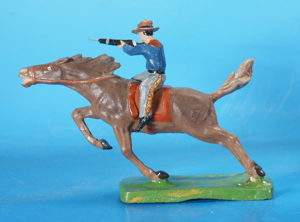 TIPPLE TOPPLE Cowboy mit Gewehr zu Pferd Masse um 1950 WTT031